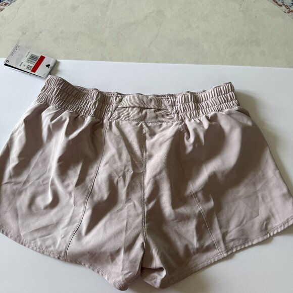 Nike Women’s Dri-FIT Training Shorts Loose Fit Size L – Pale Mauve / Light Taupe - Picture 1 of 7